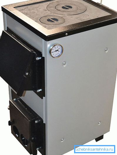 Fotoğrafta - 15 kW katı yakıtlı kazan Fotoğrafta - 15 kW katı yakıtlı kazan